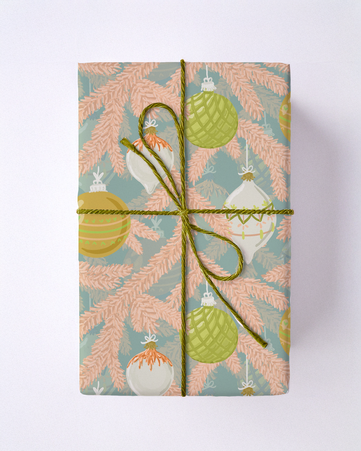 Dusty blue and peach wrapping paper with ornaments and pine design.